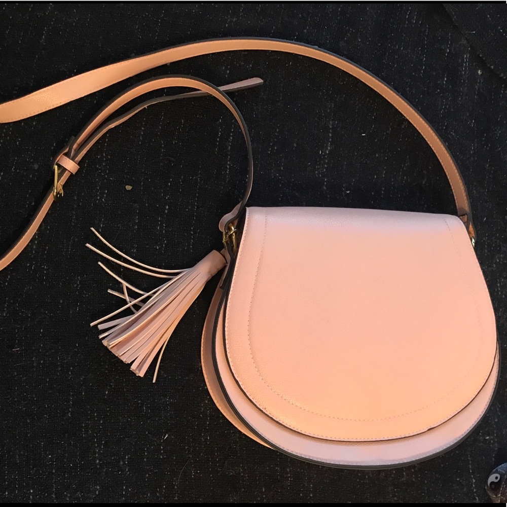 Pink tasseled purse